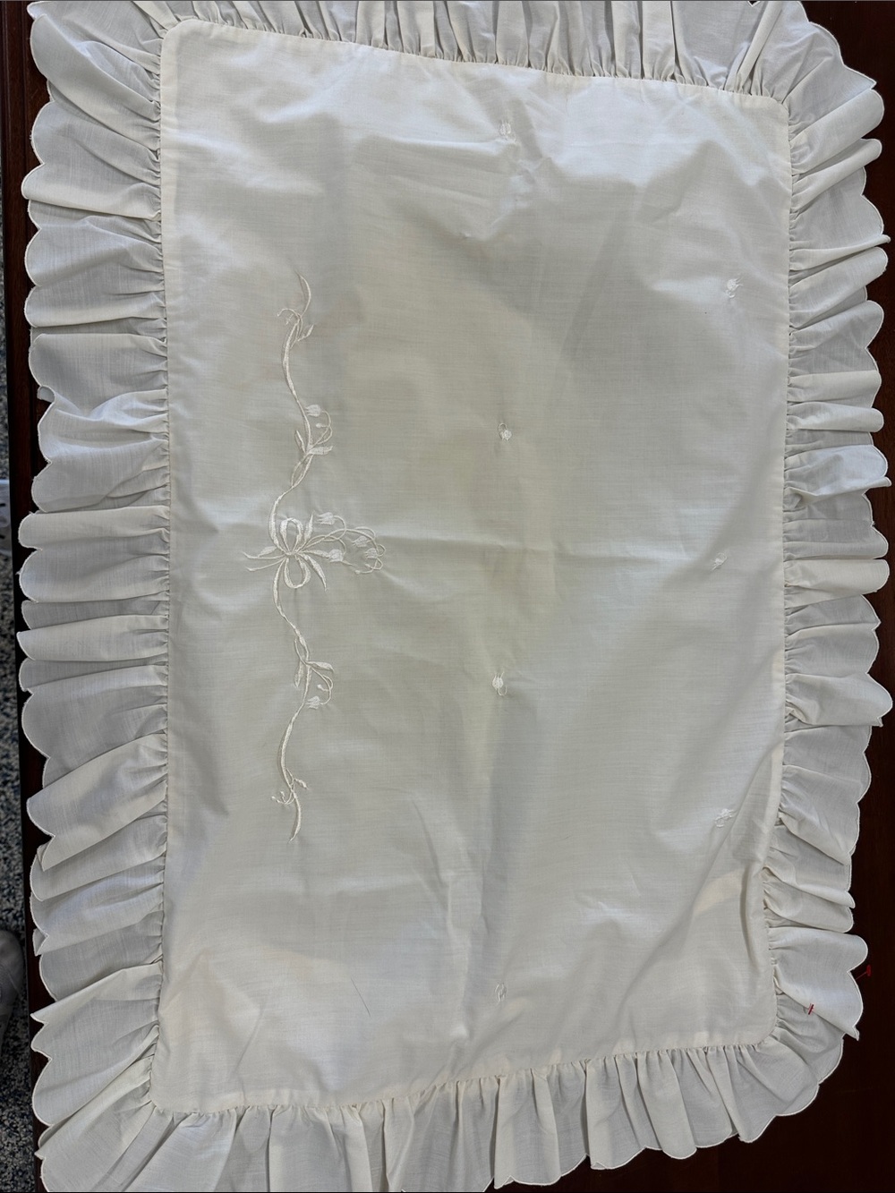 White Ruffled Pillow Sham with Embroidered Floral Detail